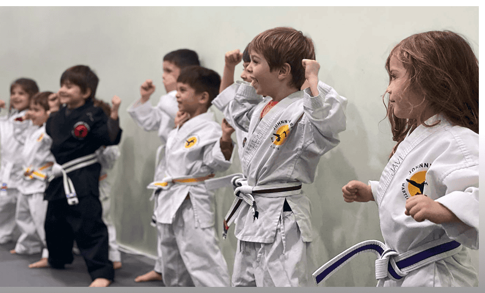 Young children practicing martial arts in a preschool class at Johnny Karate NYC.