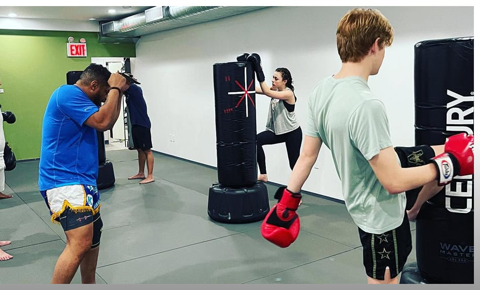 Young fighters practicing kickboxing techniques at Johnny Karate NYC gym.