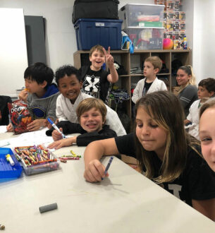 Children enjoying activities in after school program at Johnny Karate NYC.