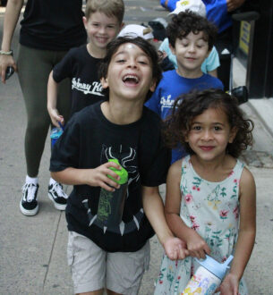 Happy kids enjoying birthday party activities at Johnny Karate NYC.