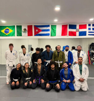 Martial arts students at Johnny Karate NYC practicing Brazilian Jiu-Jitsu in a vibrant training faci.