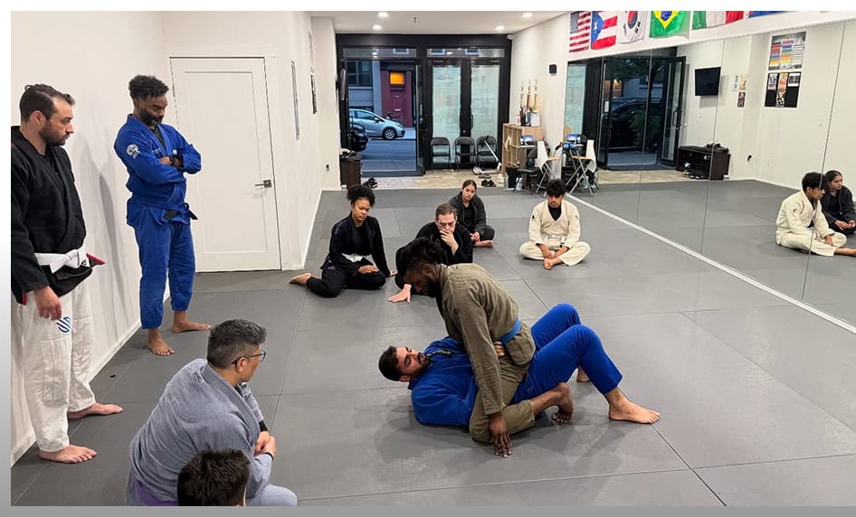 BJJ class at Johnny Karate NYC focusing on adult Brazilian Jiu-Jitsu techniques.