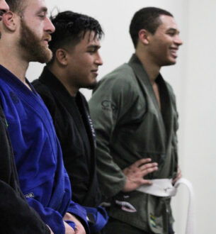JMA Adult BJJ students practicing Brazilian Jiu-Jitsu techniques.