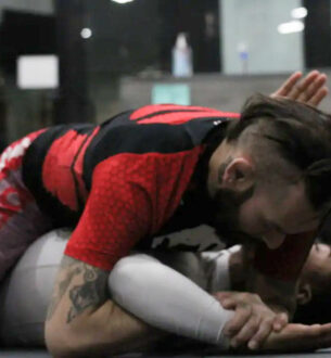 Teen BJJ student practicing grappling techniques at Johnny Karate NYC.