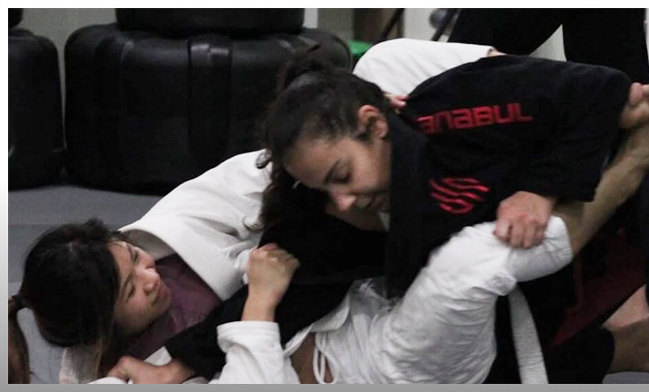Teen girls practicing Brazilian Jiu-Jitsu at JMA Teen BJJ class.