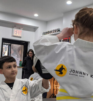 Kids martial arts class at Johnny Karate NYC, focusing on discipline and self-defense skills.