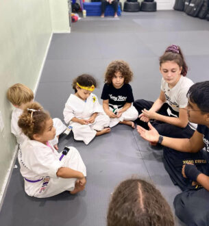 Young children practicing martial arts in a preschool class at Johnny Karate NYC.